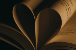 pages of an book folded into a heart